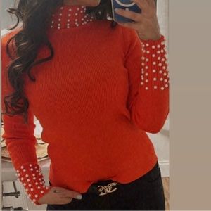 Red sweater with Pearl neck / wrists
